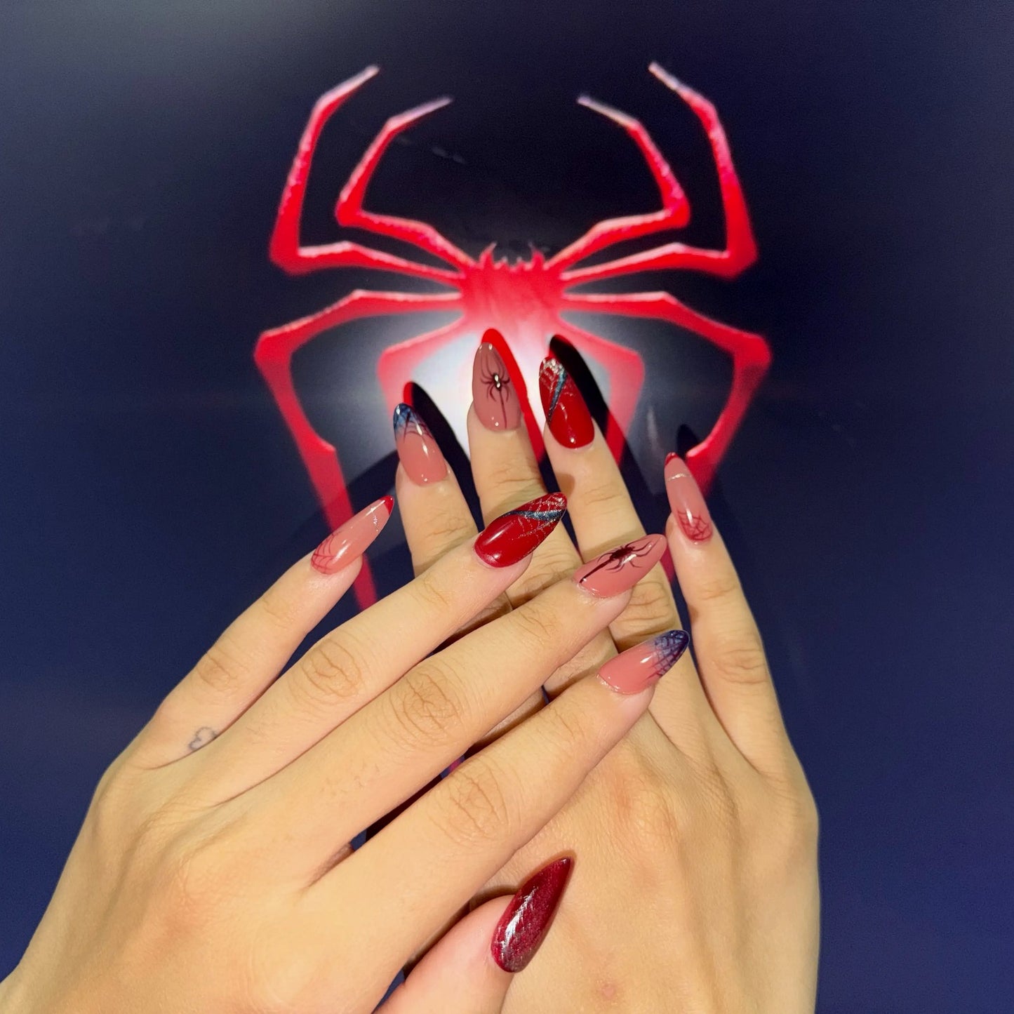 Real customer-style photo of Web Noir statement press-on nails